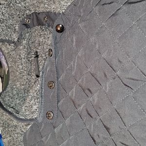 Soft Amaryllis gray teddy pull over fleece has 4 snaps st neck.